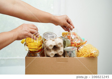 Foodstuffs in donation box for volunteer to help people. 106021245