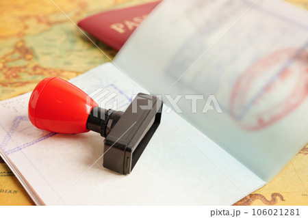 Visa and passport document to immigration at airport in country. Visa and passport document to immigration at airport in country. 106021281