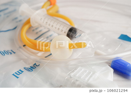 Foley catheter and urine drainage bag collect urine for disability or patient in hospital. 106021294