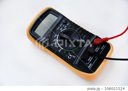 Multimeter on a white background. Voltage and current meter. 106021524