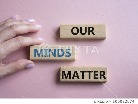 Our Minds Matter symbol. Concept words Our Minds Matter on wooden blocks. Doctor hand. Beautiful pink background. Psychological social and Our Minds Matter concept. Copy space. Our Minds Matter symbol. Concept words Our Minds Matter on wooden blocks. Doctor hand. Beautiful pink background. Psychological social and Our Minds Matter concept. Copy space. 106022074