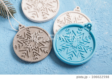 Concrete Christmas Decorations. Handmade craft gypsum objects for interior decoration. Artisan, small business, diy, hobby concept. Concrete Christmas Decorations. Handmade craft gypsum objects for interior decoration. Artisan, small business, diy, hobby concept. 106022598