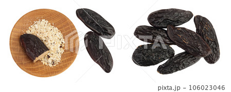 Tonka bean isolated on white background with full depth of field. Bean of Dipteryx odorata, Top view. Flat lay Tonka bean isolated on white background with full depth of field. Bean of Dipteryx odorata, Top view. Flat lay 106023046