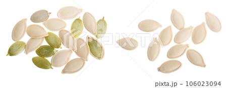 Pumpkin seeds or pepitas, isolated on white background. Top view. Flat lay Pumpkin seeds or pepitas, isolated on white background. Top view. Flat lay 106023094
