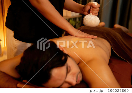 Hot herbal ball spa massage body treatment. Quiescent 106023869