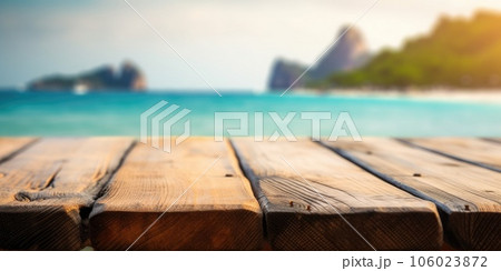 The empty wooden table top with blur background of Thailand beach. Exuberant. The empty wooden table top with blur background of Thailand beach. Exuberant. 106023872