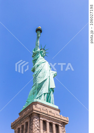 Close view of the Statue of Liberty over blue sky Close view of the Statue of Liberty over blue sky 106027198