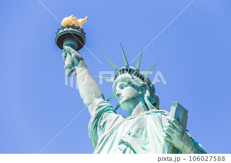Close view of the Statue of Liberty over blue sky Close view of the Statue of Liberty over blue sky 106027588