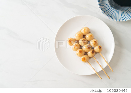 Mitarashi dango. Dumpling in a sweet soy sauce Mitarashi dango. Dumpling in a sweet soy sauce 106029445