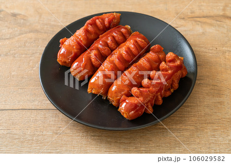deep fried sausage skewer on plate deep fried sausage skewer on plate 106029582