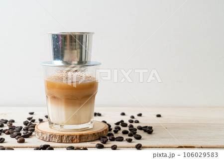 Hot milk coffee dripping in Vietnam style Hot milk coffee dripping in Vietnam style 106029583
