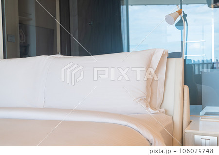 white comfortable pillows decoration on bed white comfortable pillows decoration on bed 106029748