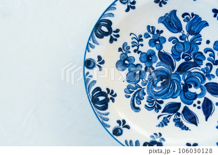 beautiful vintage porcelain plate on table beautiful vintage porcelain plate on table 106030128