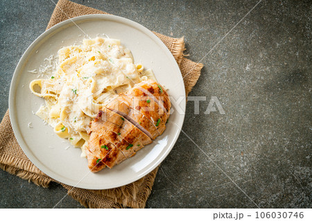 fettucine pasta white creamy sauce with grilled chicken fettucine pasta white creamy sauce with grilled chicken 106030746