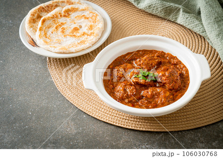 chicken tikka masala spicy curry meat food with roti or naan bread chicken tikka masala spicy curry meat food with roti or naan bread 106030768