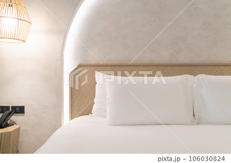 comfortable white pillows on bed 106030824