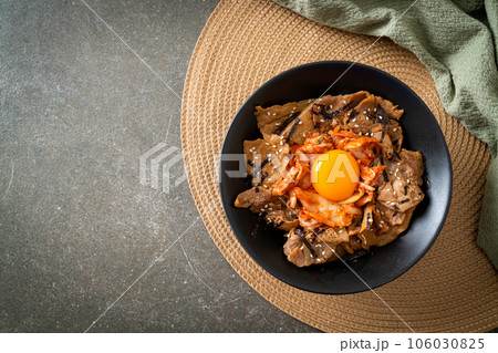 pork bulgogi rice bowl with kimchi and Korean pickled egg pork bulgogi rice bowl with kimchi and Korean pickled egg 106030825