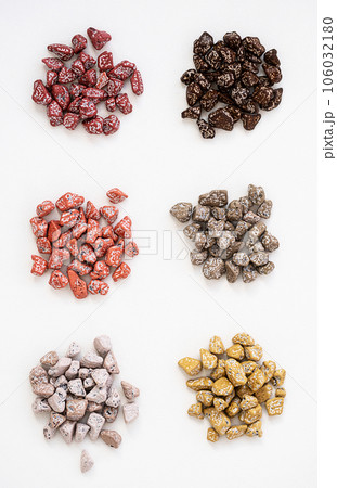 Chocolates pebble. Chocolate candies shaped rock. 106032180