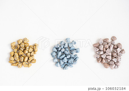 Chocolates pebble. Chocolate candies shaped rock. 106032184