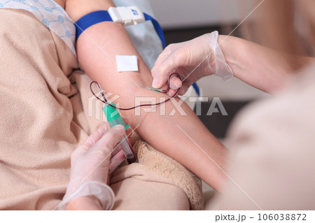 Blood sampling from vein for plasmolifting.Blood in test tube. Plasmolifting in beauty salon. 106038872