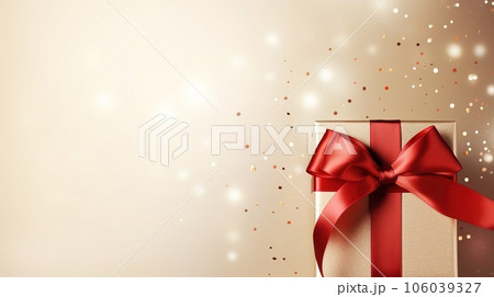 Holiday beige background with gift, red satin bow, ribbon with Copy space 106039327