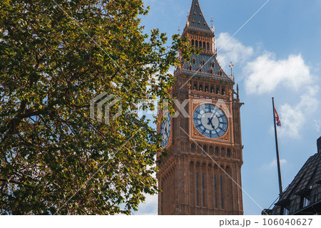 Big Ben, Westminster Bridge on River Thames in London, the UK. English symbol. Lovely puffy clouds, sunny day 106040627