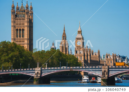 Big Ben, Westminster Bridge on River Thames in London, the UK. English symbol. Lovely puffy clouds, sunny day Big Ben, Westminster Bridge on River Thames in London, the UK. English symbol. Lovely puffy clouds, sunny day 106040749