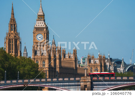 Big Ben, Westminster Bridge on River Thames in London, the UK. English symbol. Lovely puffy clouds, sunny day 106040776