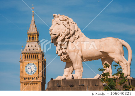 Big Ben, Westminster Bridge on River Thames in London, the UK. English symbol. Lovely puffy clouds, sunny day 106040825