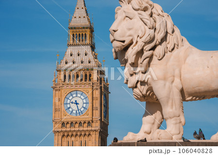 Big Ben, Westminster Bridge on River Thames in London, the UK. English symbol. Lovely puffy clouds, sunny day 106040828