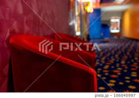 Side view area of in front gate of the movie theater with red chair. Concept of happy time 106040997
