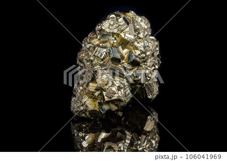 Macro mineral stone Pyrite on a black background Macro mineral stone Pyrite on a black background 106041969