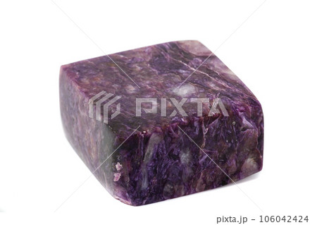 Macro mineral stone Charoite on a white background Macro mineral stone Charoite on a white background 106042424