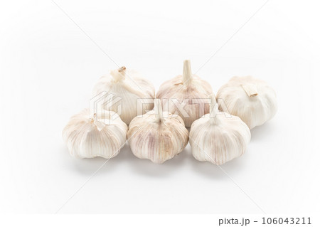 garlic placed on a white background. garlic placed on a white background. 106043211