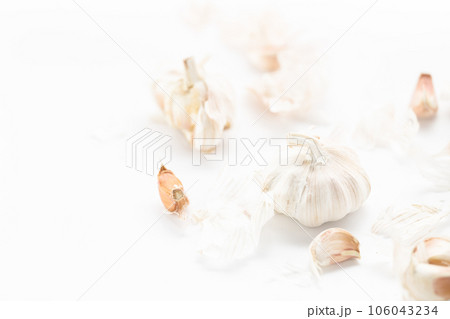 garlic placed on a white background. 106043234