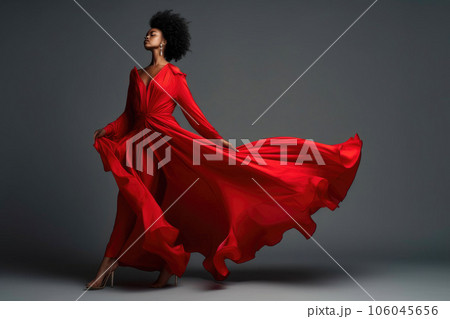 Elegant African Beauty: Dancing in Red Silk Elegant African Beauty: Dancing in Red Silk 106045656