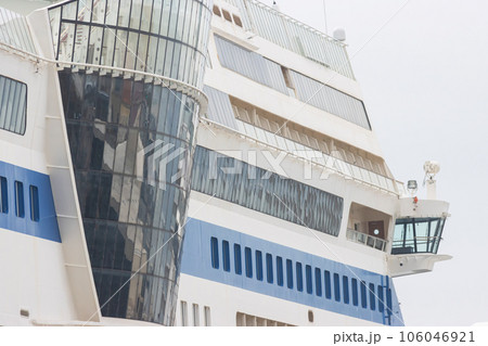 Glazed bulging part of a large white tourist cruise ship Glazed bulging part of a large white tourist cruise ship 106046921