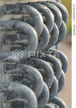 water end flow coil tubes from a large air conditioner close up background 106047037