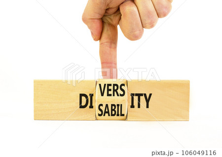DEI Diversity or disability symbol. Concept words Diversity disability on wooden block. Beautiful white table white background. Businessman hand. Business diversity disability concept. 106049116
