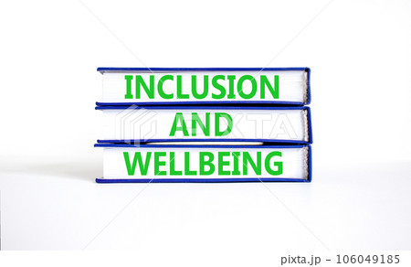 Inclusion and wellbeing symbol. Concept words Inclusion and wellbeing on beautiful book. Beautiful white table white background. Motivational inclusion and wellbeing concept. Copy space. 106049185