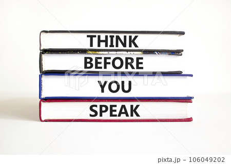 Think before you speak symbol. Concept words Think before you speak on books. Beautiful white table white background. Business think before you speak concept. Copy space. Think before you speak symbol. Concept words Think before you speak on books. Beautiful white table white background. Business think before you speak concept. Copy space. 106049202