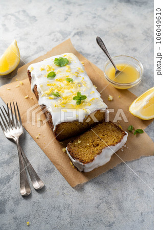 Lemon drizzle loaf cake, homemade sponge soft cake with sugar icing 106049610