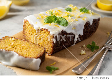 Lemon drizzle loaf cake, homemade sponge soft cake with sugar icing Lemon drizzle loaf cake, homemade sponge soft cake with sugar icing 106049635