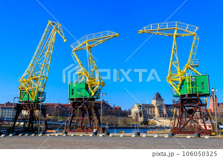 Old cranes on city boulevard in Szczecin, Poland 106050325