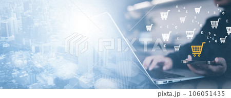 Businessman hold smartphone with online shopping concept, marketplace website with virtual interface of online Shopping cart part of the network, Online shopping business with selecting shopping cart. 106051435