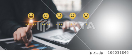 Businessman pressing smile on laptop with customer service, evaluation, best excellent business rating experience. Satisfaction survey, user give rating to service experience on online application Businessman pressing smile on laptop with customer service, evaluation, best excellent business rating experience. Satisfaction survey, user give rating to service experience on online application 106051846