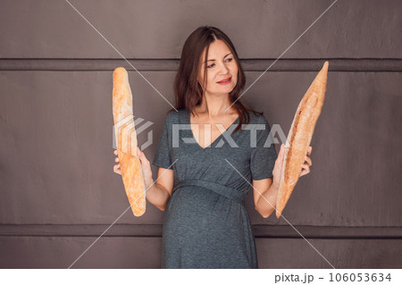 Happy and healthy pregnant woman after 40 embracing a gluten-free lifestyle during her pregnancy journey. Nourishing choices for a thriving baby and mom 106053634