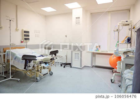 Interior of an empty hospital ward in a modern maternity clinic. Childbirth. Delivery. Labor concept. Obstetrics and gynecology. 106056476