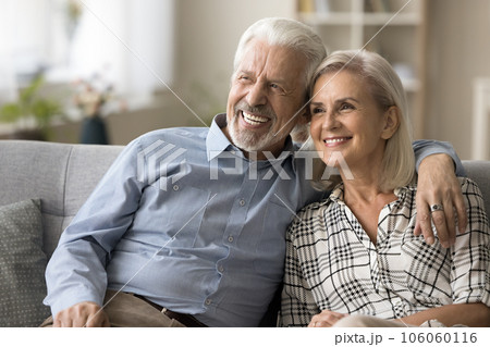 Cheerful old retired couple husband and wife enjoying leisure 106060116