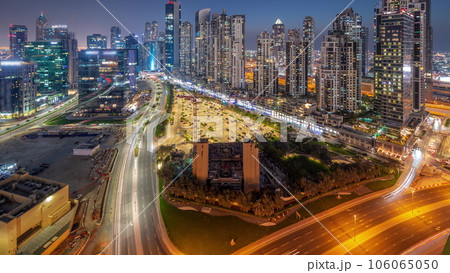 Bay Avenue with modern towers residential development in Business Bay aerial panoramic day to night timelapse, Dubai Bay Avenue with modern towers residential development in Business Bay aerial panoramic day to night timelapse, Dubai 106065050
